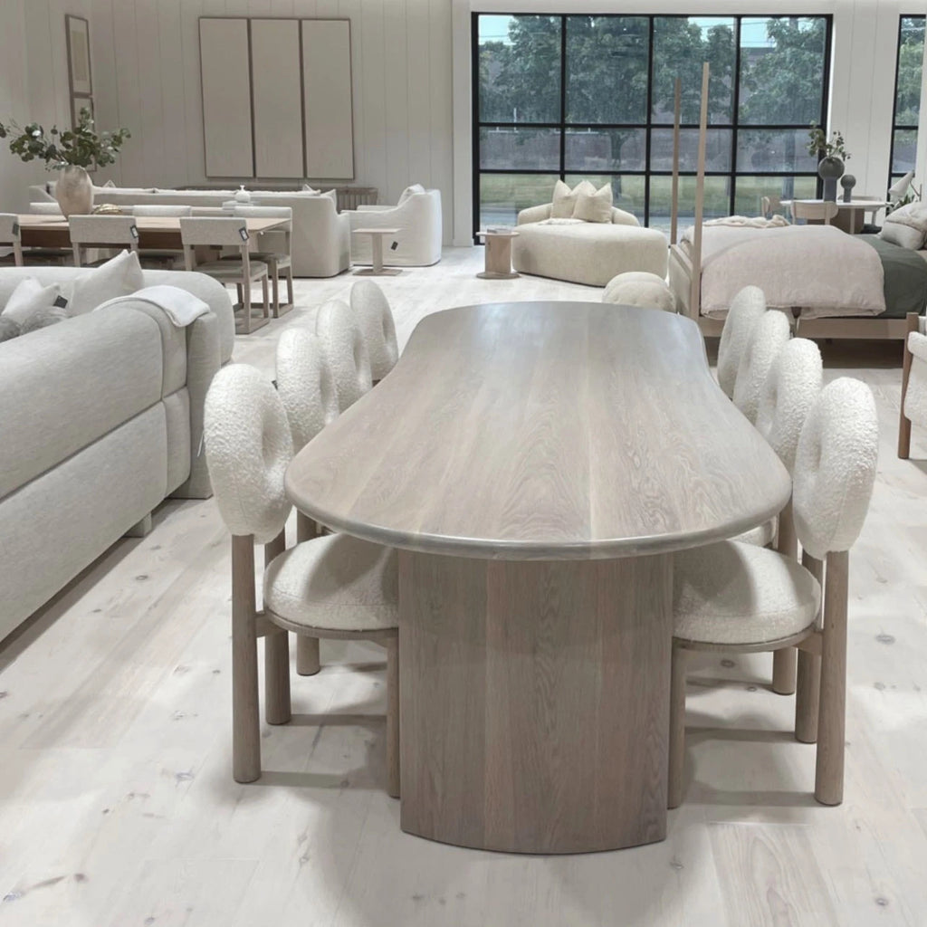 Darby Curved Dining Table shown in Mint White / Smoke | Muskoka Living Collection