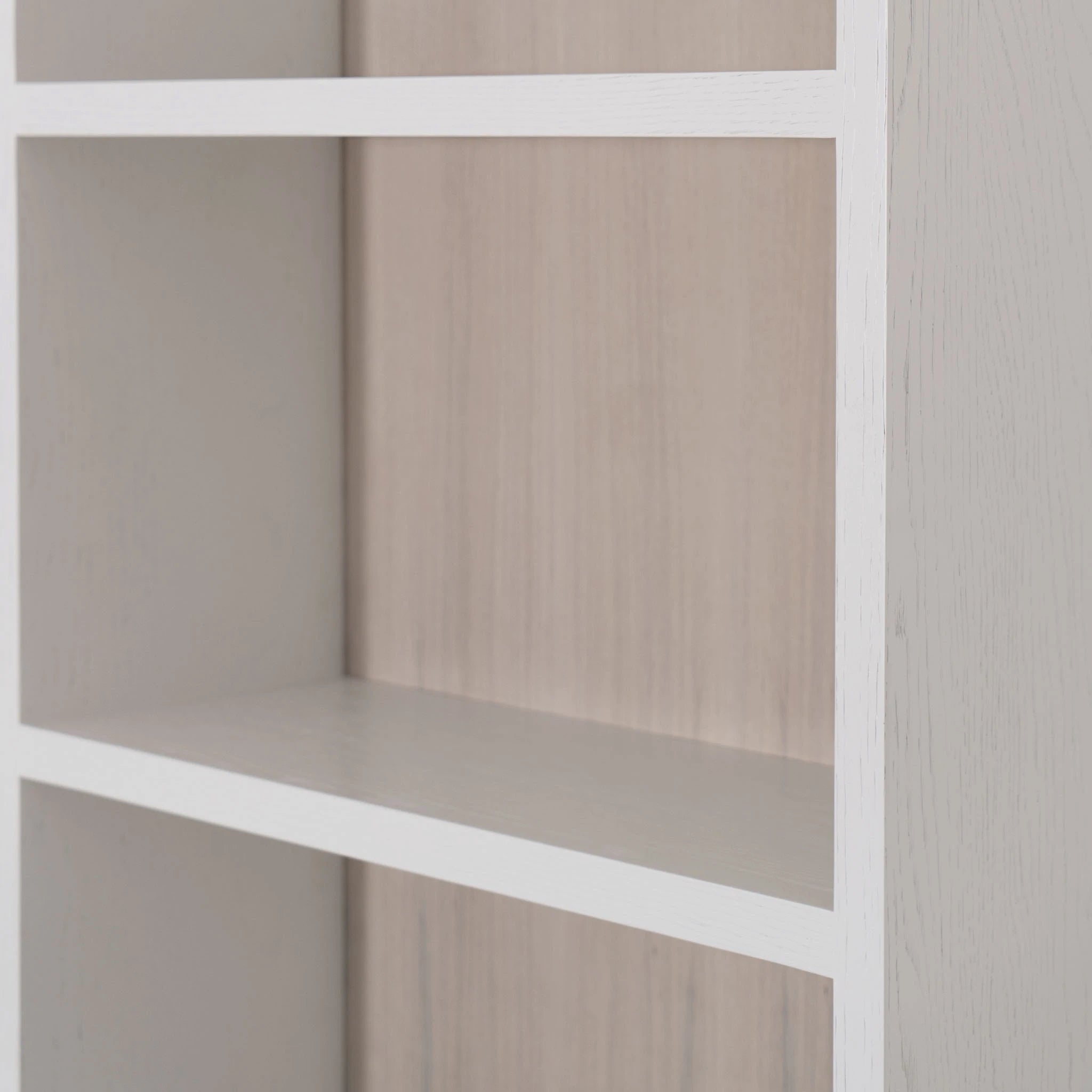 Trip - Shown in oak, finished in White wire brushed, and Nordic White Super white back panel. | Muskoka Living Collection - Bookcases