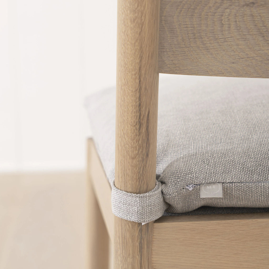 Shown with Retro Light Grey cushion. Oak finished in Mint White / Natural