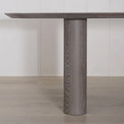 Darby dining table shown in Fumed Smoke | Muskoka Living Collection