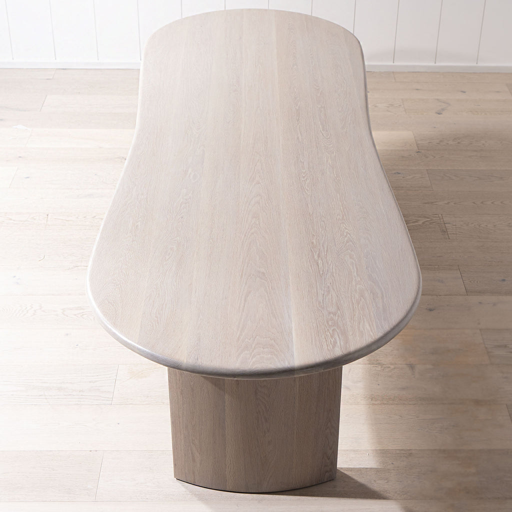 Darby Curved Dining Table shown in Mint White / Smoke | Muskoka Living Collection