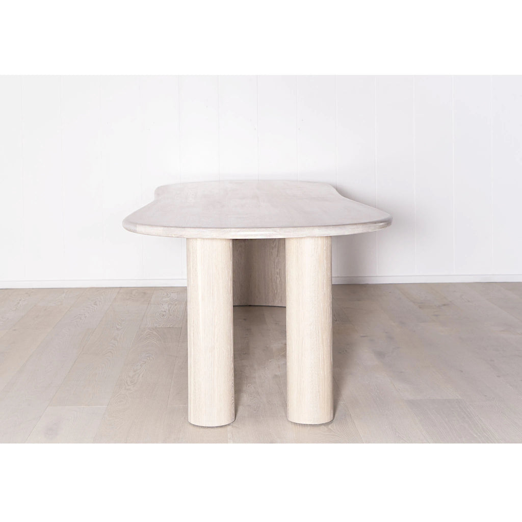 Darby Curved Dining Table shown in Mint White / Smoke | Muskoka Living Collection