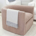 Fletcher Chair, shown in swivel, slipcovered Granby Clay | Muskoka Living Collection