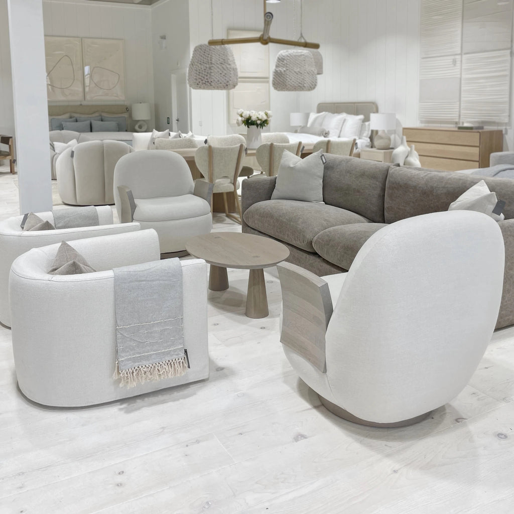 Fletcher Chair, Shown in swivel, slipcovered Monte Natural at our Toronto showroom | Muskoka Living Collection