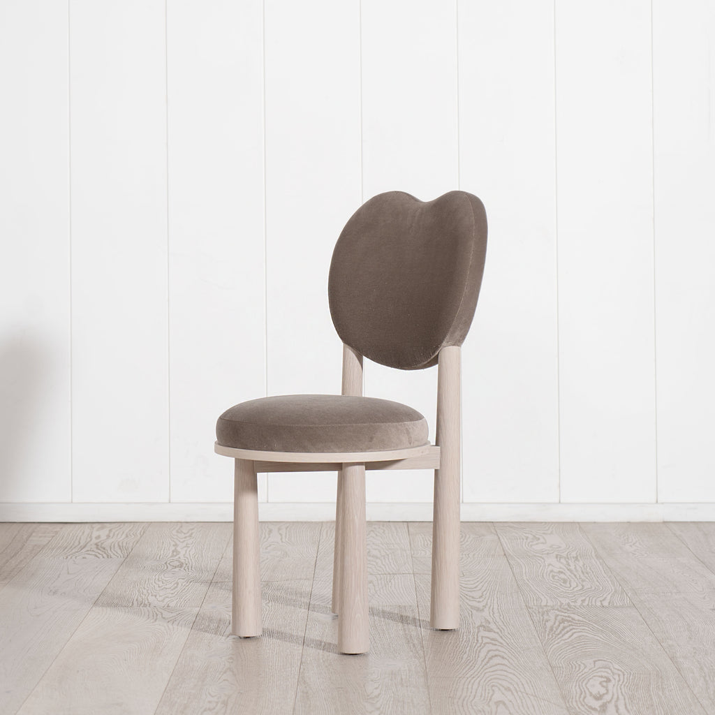 The Violet dining chair  - the Muskoka Living Collection. Made to order at our self-owned and operated workshop in LA. Sintra Taupe and Alpaca White Smoke finish.