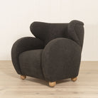 Optic Chair, Muskoka Living Collection - Shown in Sheepskin Charcoal. Oak finished in Natural. 